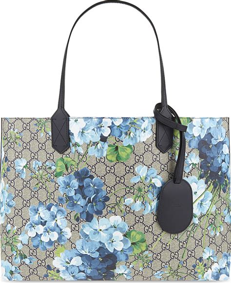 gucci tote blue blooms|Gucci Bloom make up bag.